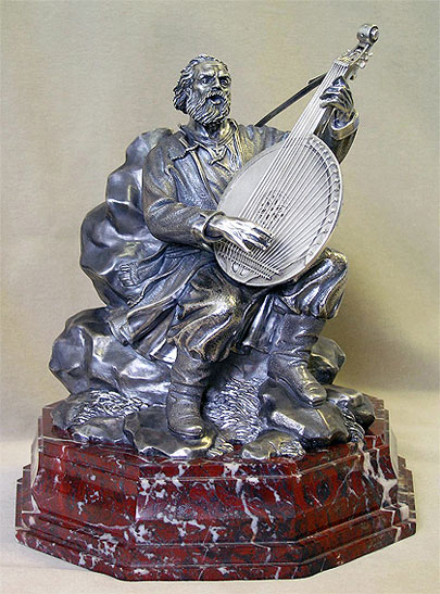 серебряная скульптура Кобзарь